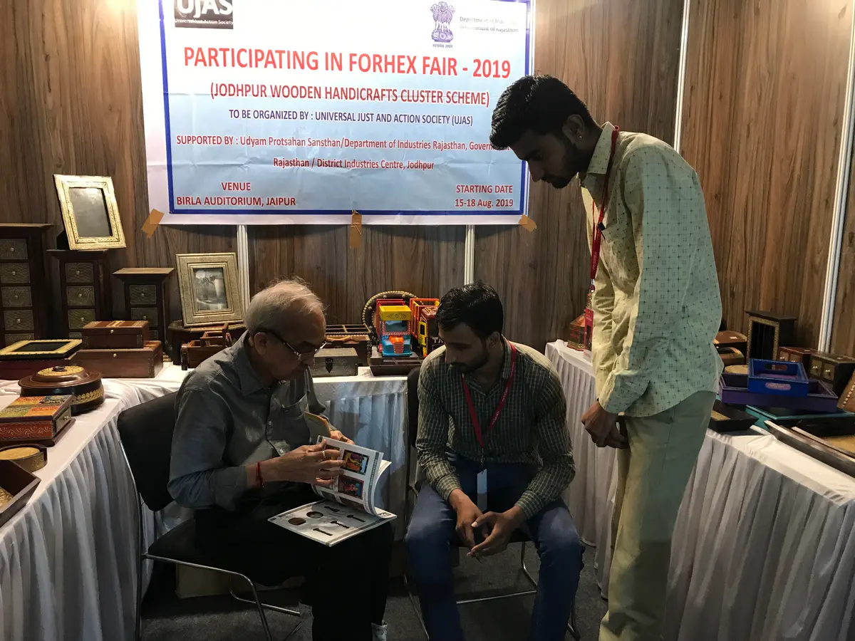 Reviewing the product catalogue at the FORHEX Fair, Birla Auditorium, Jaipur, August 2019.